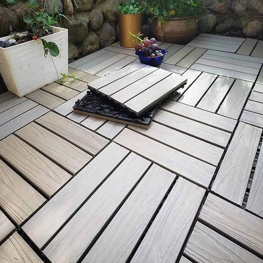 Loseta composite gris carbón en terraza moderna